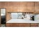 Efficient kitchen with updated countertops and modern appliances at 849 E Lancaster Cir, Florence, AZ 85132