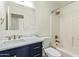 Modern bathroom featuring a vanity with sink, marble countertop, blue cabinets with gold hardware and bath tub at 8867 E Avenida Las Noches --, Gold Canyon, AZ 85118