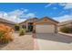 Charming single-story home featuring a neutral color palette, low-maintenance desert landscaping, and a spacious two-car garage at 8867 E Avenida Las Noches --, Gold Canyon, AZ 85118