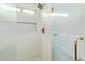 Bright and modern shower with subway tile, mosaic tile accents, and glass doors at 8867 E Avenida Las Noches --, Gold Canyon, AZ 85118