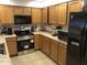 Well-equipped kitchen with stainless steel appliances and plenty of counter space at 8870 N 48Th Ln, Glendale, AZ 85302