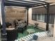 Charming patio featuring a covered seating area, perfect for outdoor relaxation and entertaining at 8870 N 48Th Ln, Glendale, AZ 85302