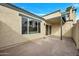 Spacious back patio offers room for outdoor entertaining and relaxation with a covered area and ample sunlight at 9036 N 51St Ln, Glendale, AZ 85302