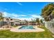 Inviting community pool with lounge areas and picnic tables, perfect for relaxing and socializing at 9036 N 51St Ln, Glendale, AZ 85302
