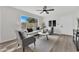 Inviting living room featuring a large window, comfortable seating, and stylish decor at 9036 N 51St Ln, Glendale, AZ 85302