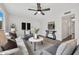 Cozy living room features neutral colors, stylish decor, and access to other living areas at 9036 N 51St Ln, Glendale, AZ 85302