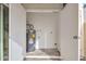 Utility room with water heater, offering convenience and functionality with easy access for maintenance at 9036 N 51St Ln, Glendale, AZ 85302