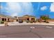 Charming single-story home with a desert-landscaped yard and a spacious driveway at 9302 W Georgia Ave, Glendale, AZ 85305