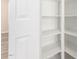 Spacious white storage room featuring built-in shelves at 9431 E Coralbell Ave # 60, Mesa, AZ 85208