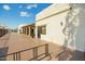 The exterior of the community center, with large columns and stucco exterior at 9431 E Coralbell Ave # 60, Mesa, AZ 85208
