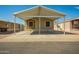 Charming home with a covered parking featuring classic design elements at 9431 E Coralbell Ave # 60, Mesa, AZ 85208
