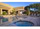 Community pool with plenty of lounge chairs, sun umbrellas, and a nearby spa at 9560 E Preserve Way, Scottsdale, AZ 85262
