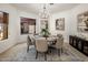 Elegant dining room with stylish chandelier and coordinated decor at 9560 E Preserve Way, Scottsdale, AZ 85262