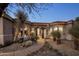 Landscaped walkway to an arched entry welcomes you to this property with desert landscaping at 9560 E Preserve Way, Scottsdale, AZ 85262
