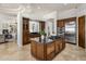 Gourmet kitchen with stainless steel appliances and a large island at 9560 E Preserve Way, Scottsdale, AZ 85262