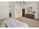 Comfortable main bedroom with natural light, wooden dresser, stylish décor, and cozy ambiance at 9560 E Preserve Way, Scottsdale, AZ 85262