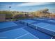 Multiple blue tennis and pickleball courts offer ample recreational space at 9560 E Preserve Way, Scottsdale, AZ 85262