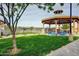 Community park featuring a covered gazebo, picnic tables, and a BBQ grill for outdoor gatherings at 974 E Palomino Way, San Tan Valley, AZ 85143