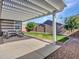 Outdoor patio with pergola and furniture, perfect for outdoor dining at 9821 E Supernova Dr, Mesa, AZ 85212