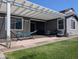Backyard features a covered patio with ample seating and a hammock at 9821 E Supernova Dr, Mesa, AZ 85212