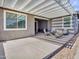 Wide patio featuring a pergola, creating a shaded outdoor space for relaxation and enjoyment at 9821 E Supernova Dr, Mesa, AZ 85212