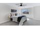 Bedroom featuring a large bed, a window, and neutral color palette at 1012 E Rosebud Dr, San Tan Valley, AZ 85143