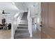 Grand entryway featuring a staircase with carpet and a light and airy ambiance at 1012 E Rosebud Dr, San Tan Valley, AZ 85143