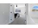 Upstairs hallway with neutral colors leading to carpeted bedrooms at 1012 E Rosebud Dr, San Tan Valley, AZ 85143