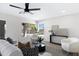 Bright living room featuring modern furnishings, area rug, recessed lights and large windows for ample light at 1012 E Rosebud Dr, San Tan Valley, AZ 85143