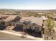 Suburban home showcasing tile roof, desert landscaping and attached garage at 10249 W Redbird Rd, Peoria, AZ 85383