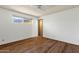 This bedroom is illuminated with natural light through the large window at 104 S Doran --, Mesa, AZ 85204