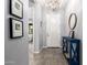 Bright foyer with neutral colors, tiled floor, and stylish decor at 10532 E Palladium Dr, Mesa, AZ 85212