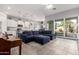 Open-concept living room seamlessly connected to the kitchen, perfect for Gathering gatherings at 10532 E Palladium Dr, Mesa, AZ 85212