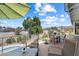 Relaxing balcony with dining table and seating area, perfect for enjoying views of the surrounding landscape at 10800 N 101St St, Scottsdale, AZ 85260