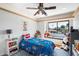 bedroom featuring a ceiling fan, window seat, and playful Paw Patrol bedding at 10800 N 101St St, Scottsdale, AZ 85260