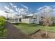 Modern home with well-maintained lawn, pool, and outdoor living area at 109 E Hayward Ave, Phoenix, AZ 85020