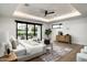 Bright main bedroom featuring a seating area and access to the home's outdoor area at 109 E Hayward Ave, Phoenix, AZ 85020