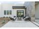 Cozy outdoor patio featuring stylish furniture and a view of the well landscaped yard at 109 E Hayward Ave, Phoenix, AZ 85020