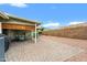 Spacious back patio features stylish pavers and a covered area, ideal for outdoor entertaining and relaxation at 11010 E Keats Ave, Mesa, AZ 85209