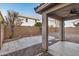 Spacious backyard with paver patio under a covered patio, with a privacy fence at 11918 W Yearling Ct, Peoria, AZ 85383