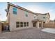 Enjoy this low-maintenance backyard with a covered patio, creating a perfect retreat at 11918 W Yearling Ct, Peoria, AZ 85383