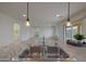 Modern kitchen featuring a stainless steel sink, stylish faucet, and elegant pendant lighting at 1257 N 166Th Ave, Goodyear, AZ 85338