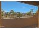 View from the patio showing the common area with playground and walking paths at 1257 N 166Th Ave, Goodyear, AZ 85338