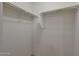 Spacious walk-in closet includes shelving, providing ample storage at 1257 N 166Th Ave, Goodyear, AZ 85338