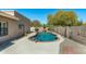 Private backyard pool with sleek, modern design surrounded by a concrete patio at 14401 N 60Th Pl, Scottsdale, AZ 85254