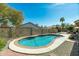 Backyard pool and patio area provides a relaxing oasis with meticulous landscaping at 14401 N 60Th Pl, Scottsdale, AZ 85254