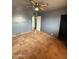 Bedroom featuring tile flooring, a ceiling fan, and neutral-tone walls at 1616 E Pecan Rd, Phoenix, AZ 85040