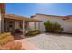 Cozy single-story house featuring a covered front porch and desert landscaping in a peaceful neighborhood at 1632 Leisure World --, Mesa, AZ 85206