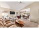 Bright living room with a ceiling fan, multiple sofas, and a dining area at 1632 Leisure World --, Mesa, AZ 85206