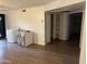 Spacious room featuring vinyl floors and access to outdoor space at 16402 N 31St St # 117, Phoenix, AZ 85032